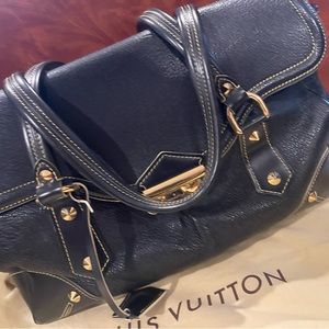 Slightly used LV Suhali bag in GM black.